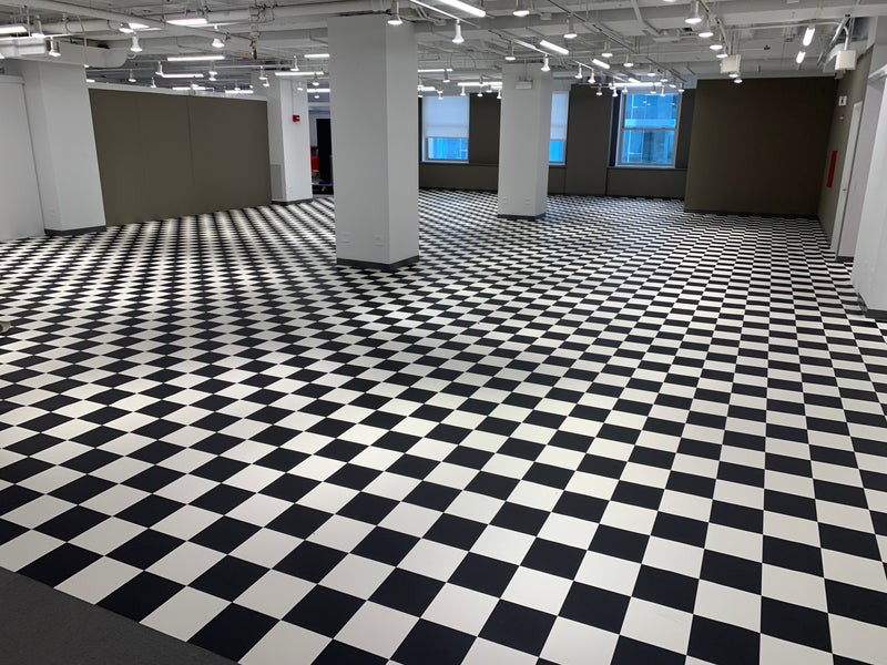 Checkered Design Garage Flooring and Checker Pattern Roll-Out